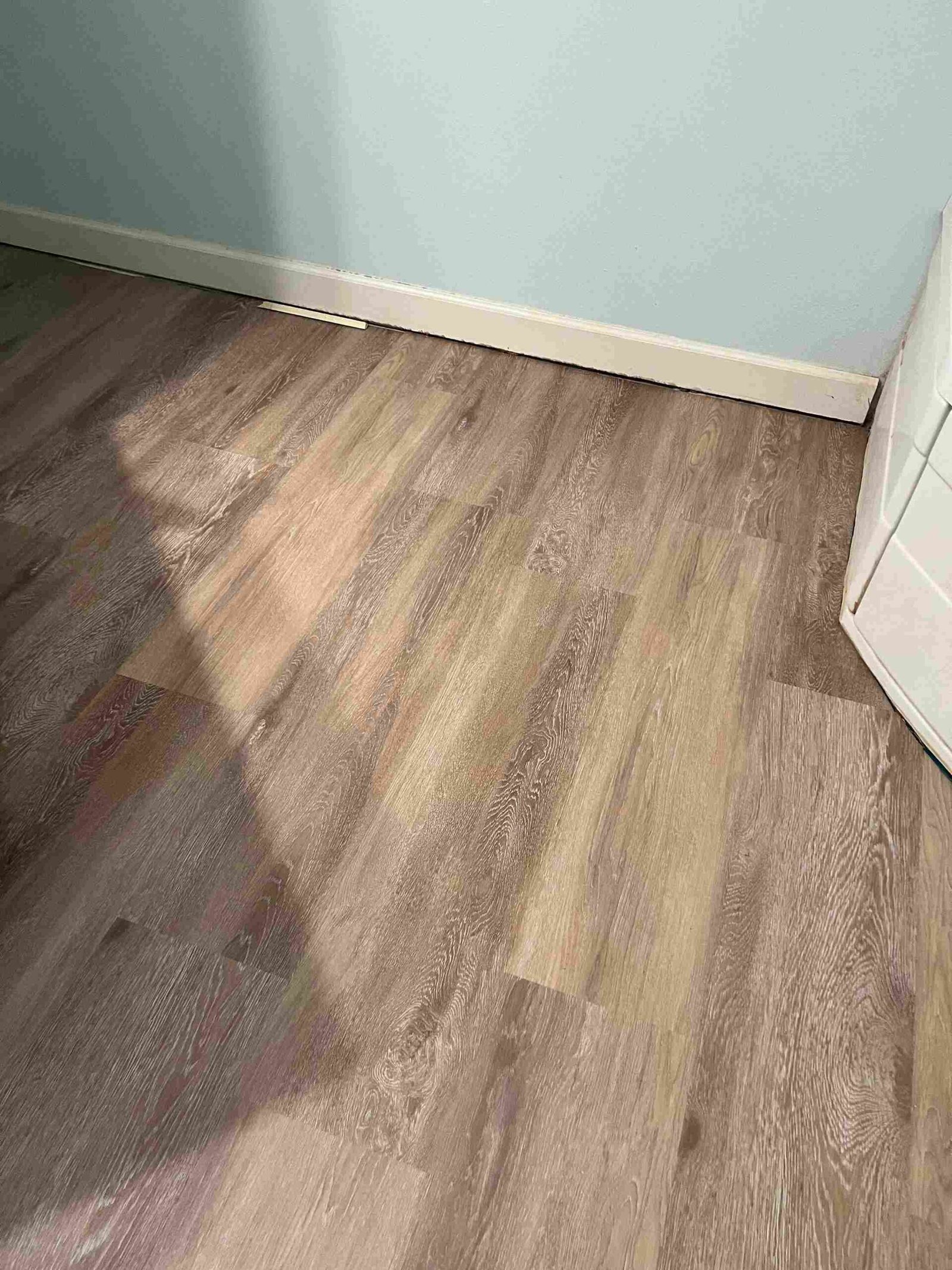 Wood-look waterproof luxury vinyl plank (LVP) flooring installed by Barys Tile in Panama City Beach