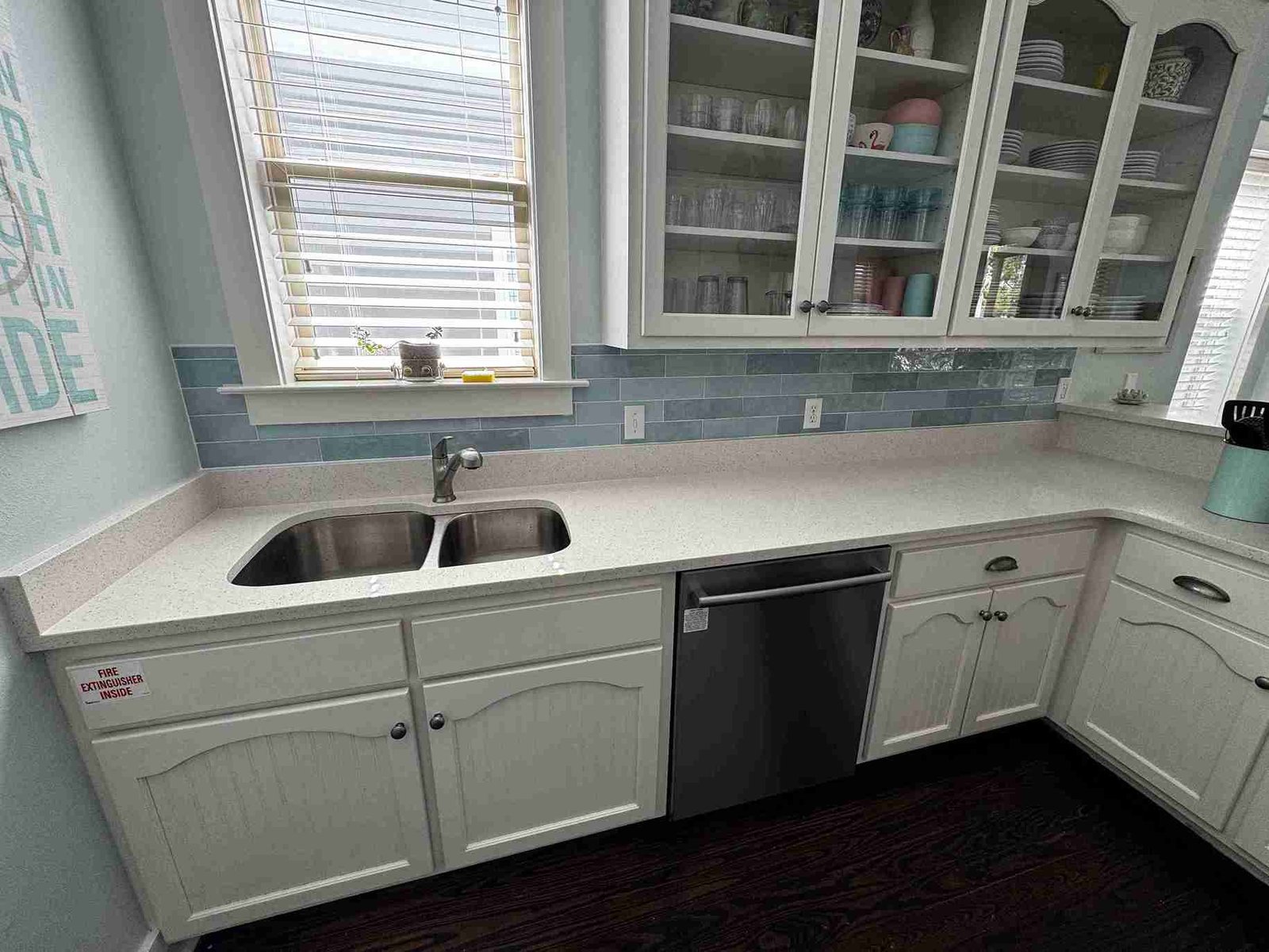 Kitchen with light blue mosaic tile backsplash installed by Barys Tile in Santa Rosa Beach